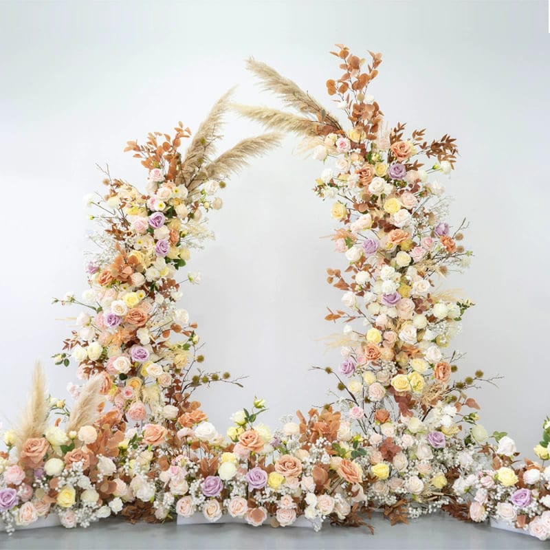 Artificial floral arch reference with mixed flowers for event planners