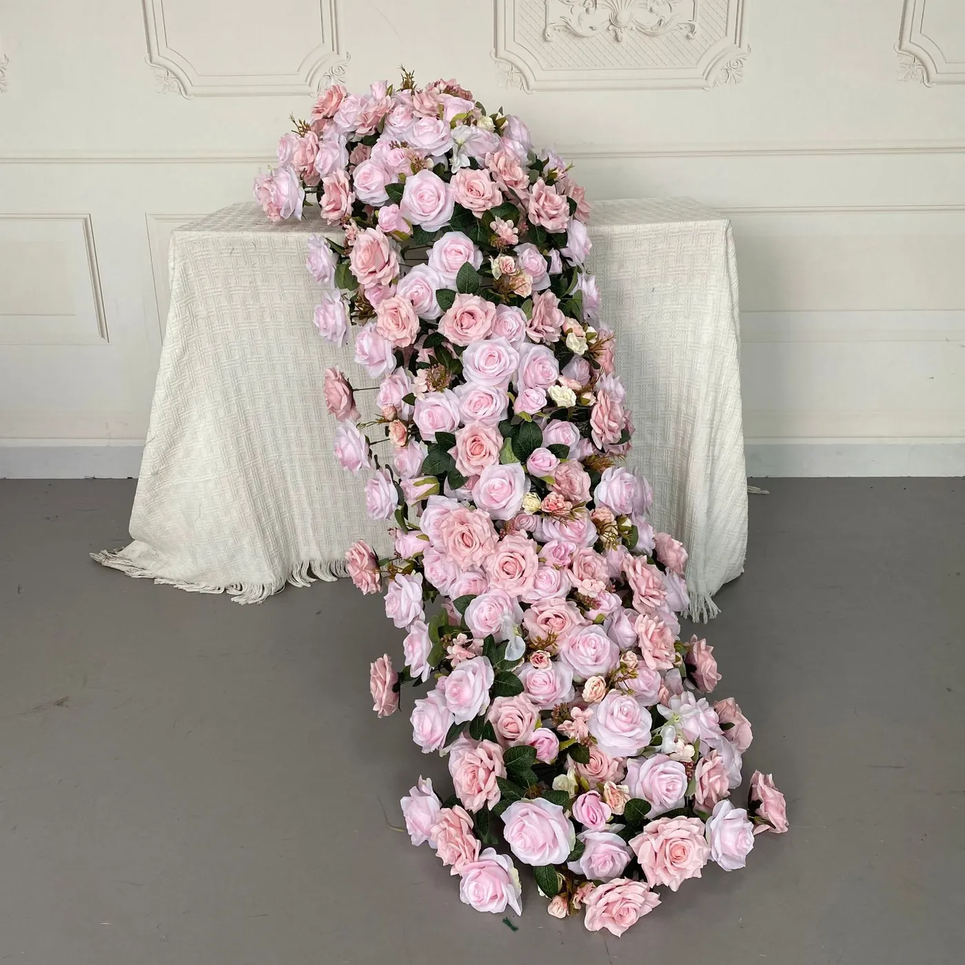 Blush pink cascading artificial flower table runner
