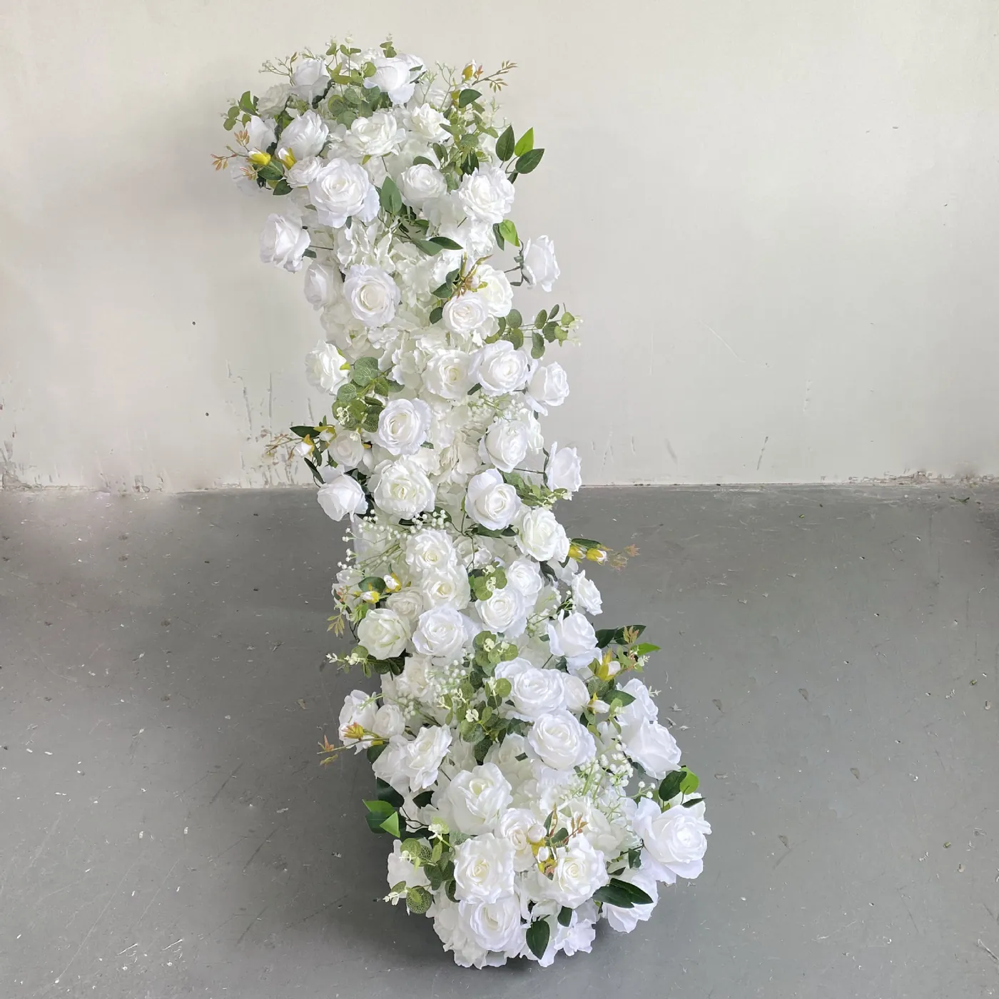 White cascading artificial flower table runner