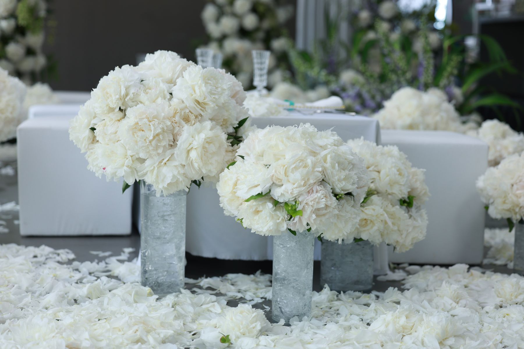 Real white floral event setting shown as styling inspiration