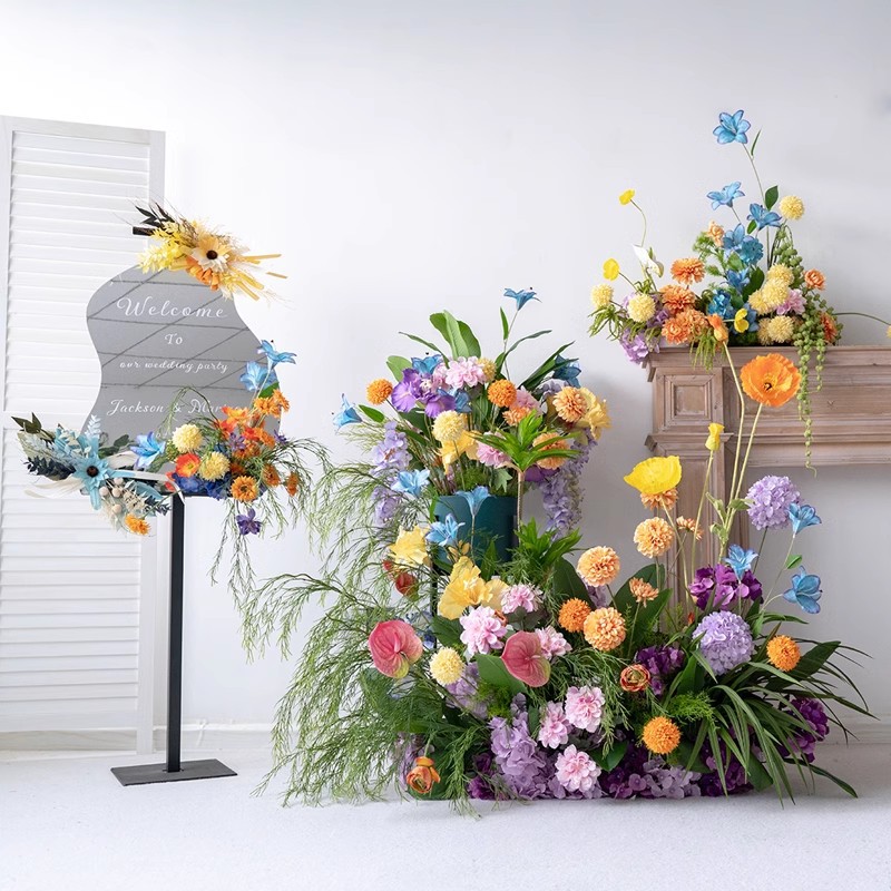 Colourful ground faux floral arrangement photographed in the supplier studio