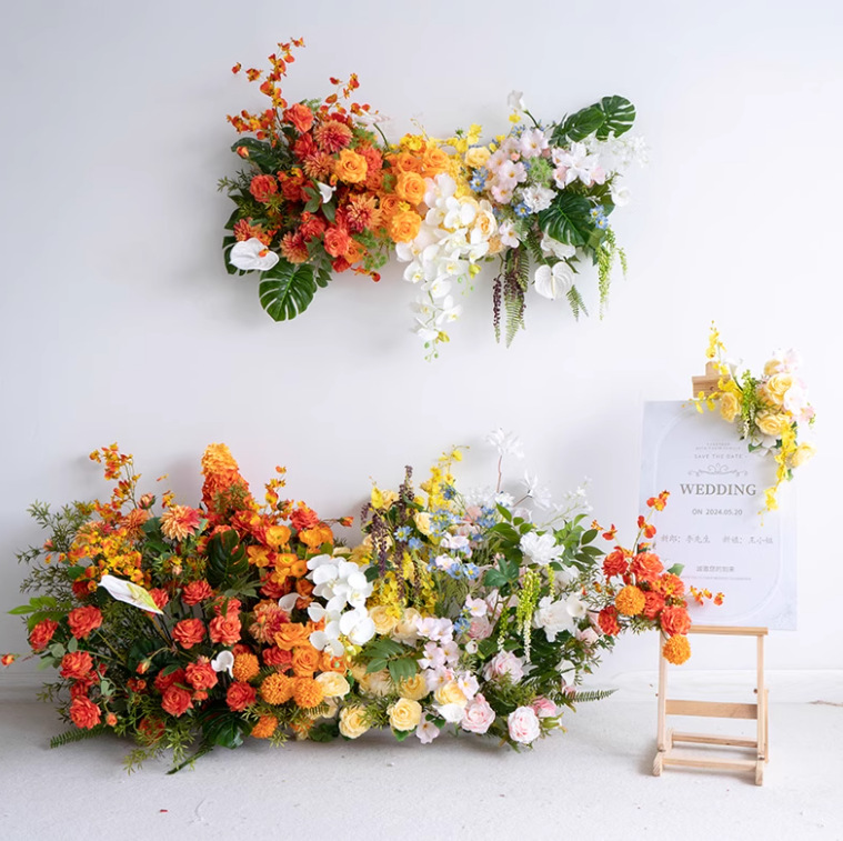 Orange and white faux floral scene photographed in the supplier studio